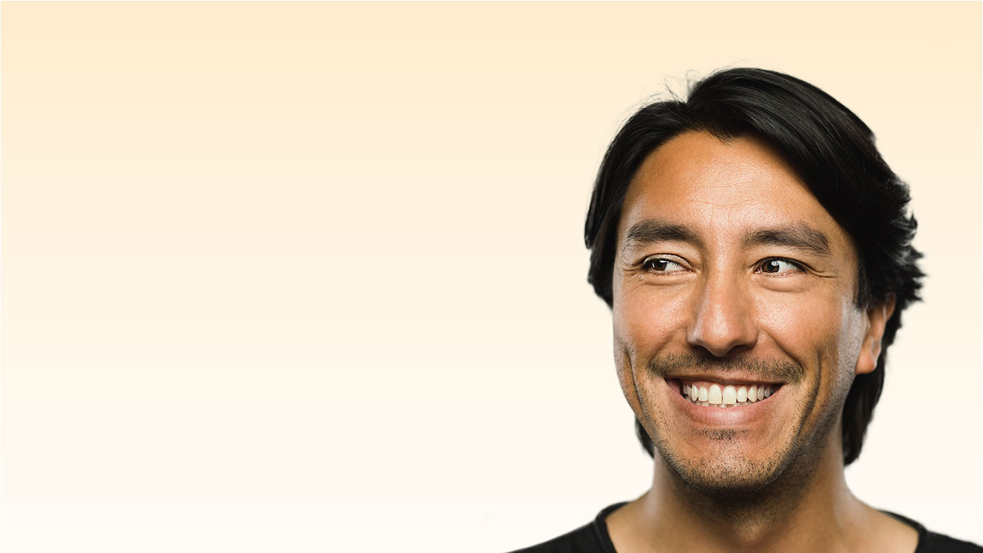 Portrait of Hispanic man with happy expression looking to the side