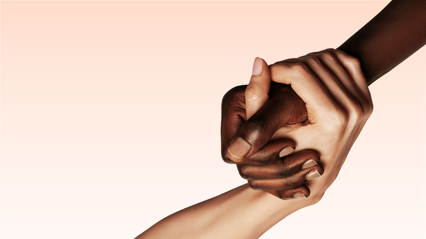 Two hands interlocking