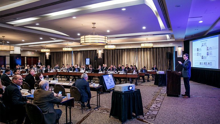 Dan McDonald, program lead for the II-ON at Bristol Myers Squibb, delivers a presentation to the II-ON attendees.