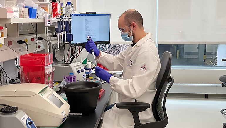 Matt working in the lab at Bristol Myers Squibb.