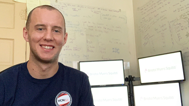 U.S. Army veteran Ryan McGinnis, a cybersecurity intern, created his own virtual workspace in his bedroom in New Brunswick, New Jersey.